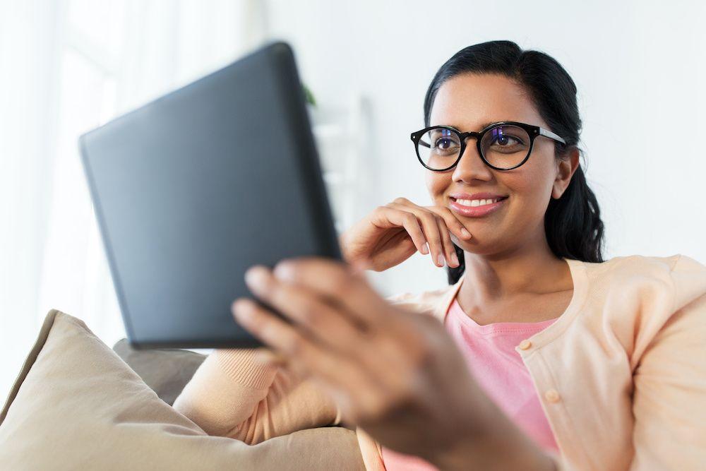 Woman Reading Tablet