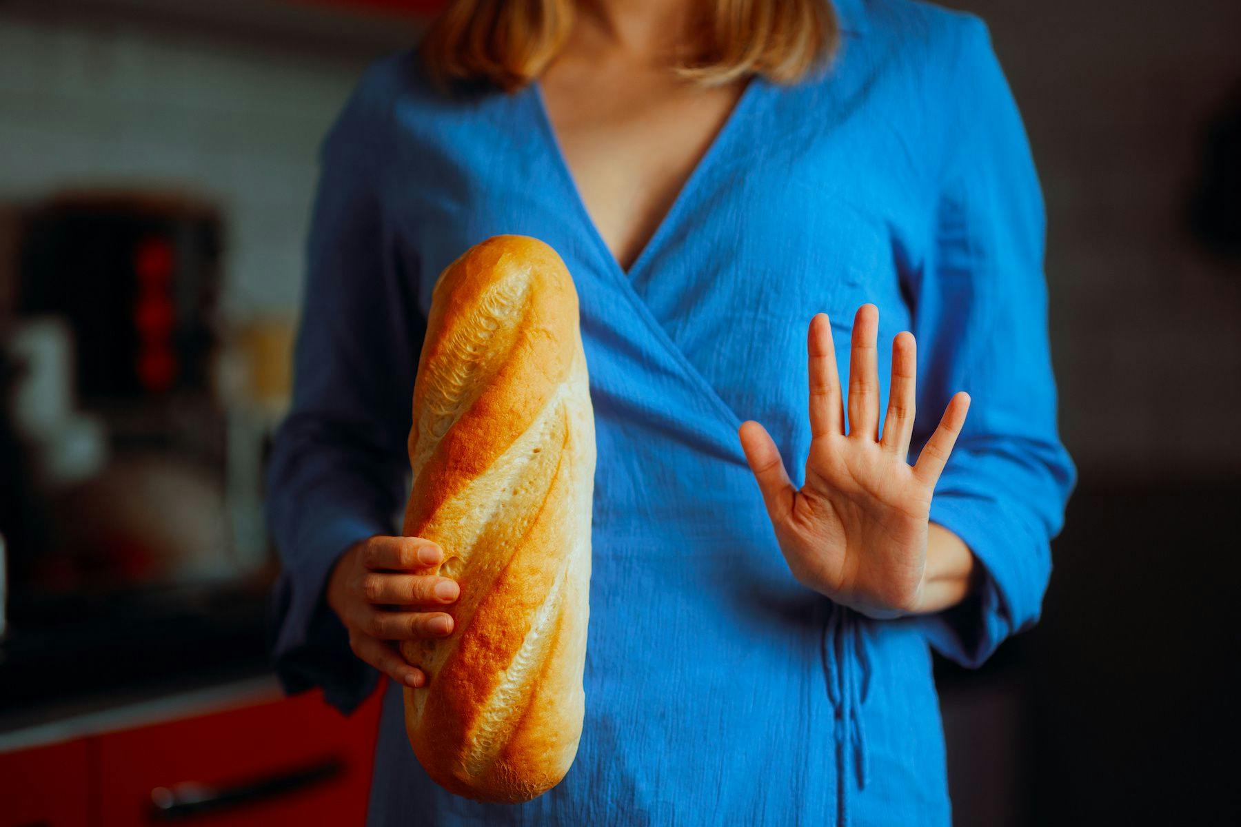 Woman refusing bread